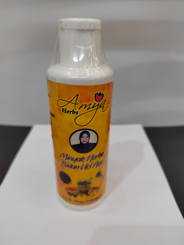 Minyak Herba Bidan Uci Aya